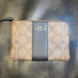 Coach Tan and Black Signature Wristlet!